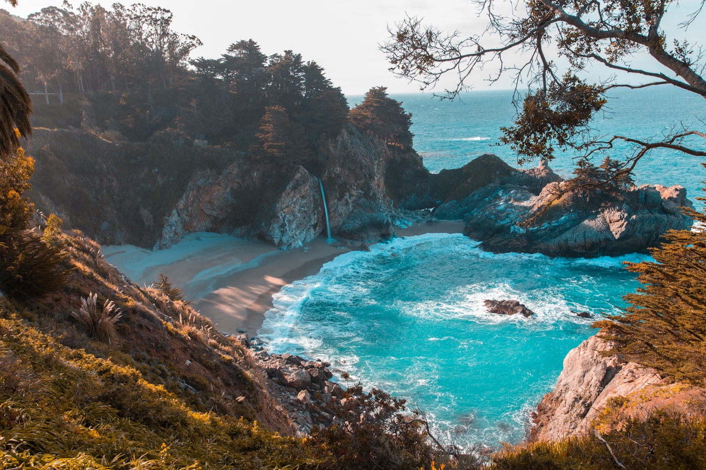 A secluded coastal cove with turquoise water