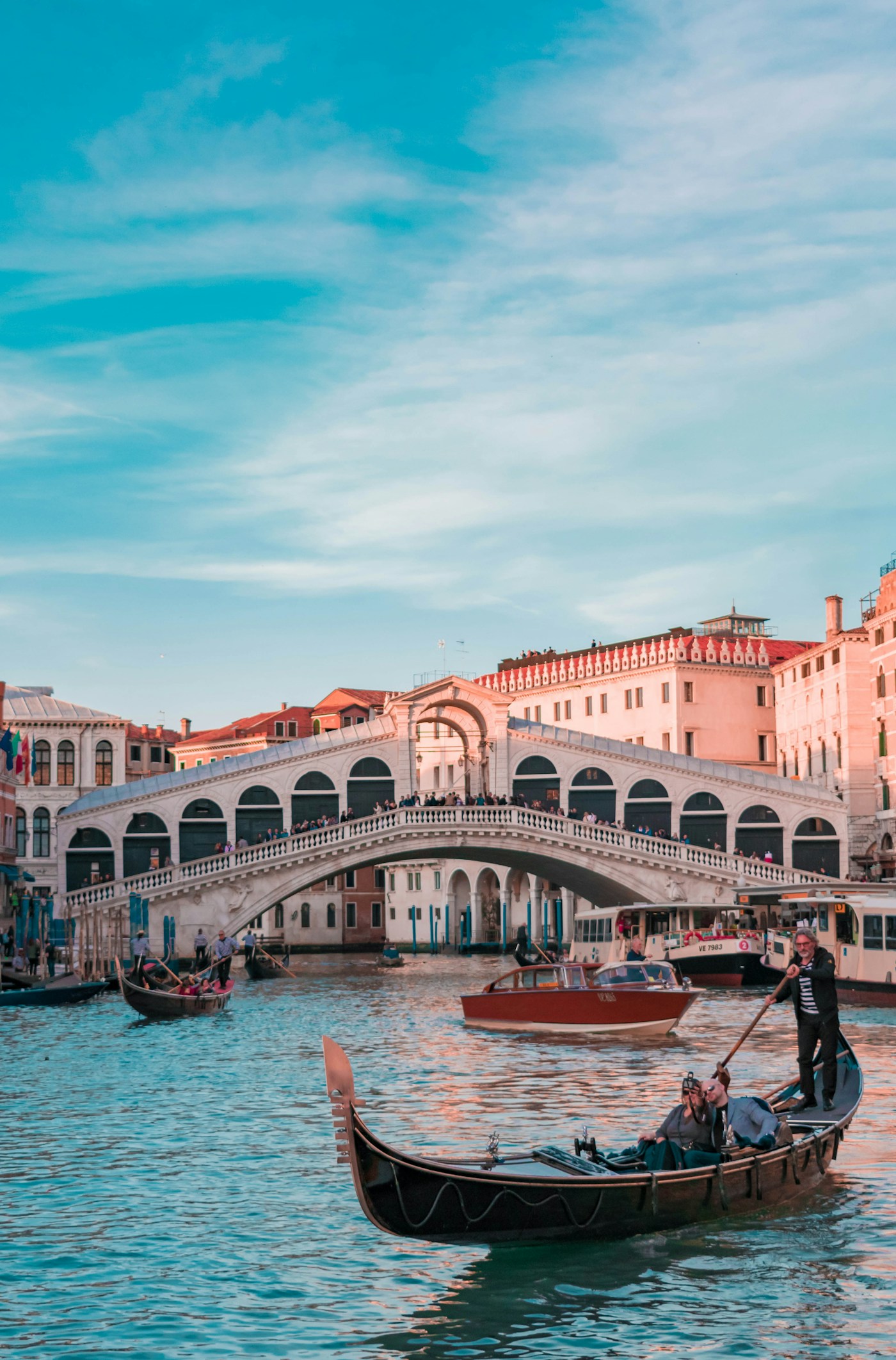 Gondola passing beneath the Rialto Bridge in Venice